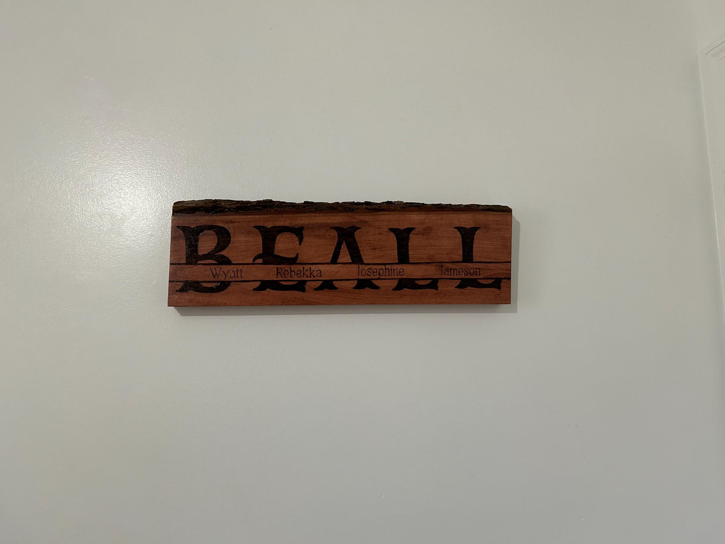 Personalized Wood-Burned Family Name Sign – Handmade Live Edge Basswood – Custom Last Name & Members – Rustic Home Decor